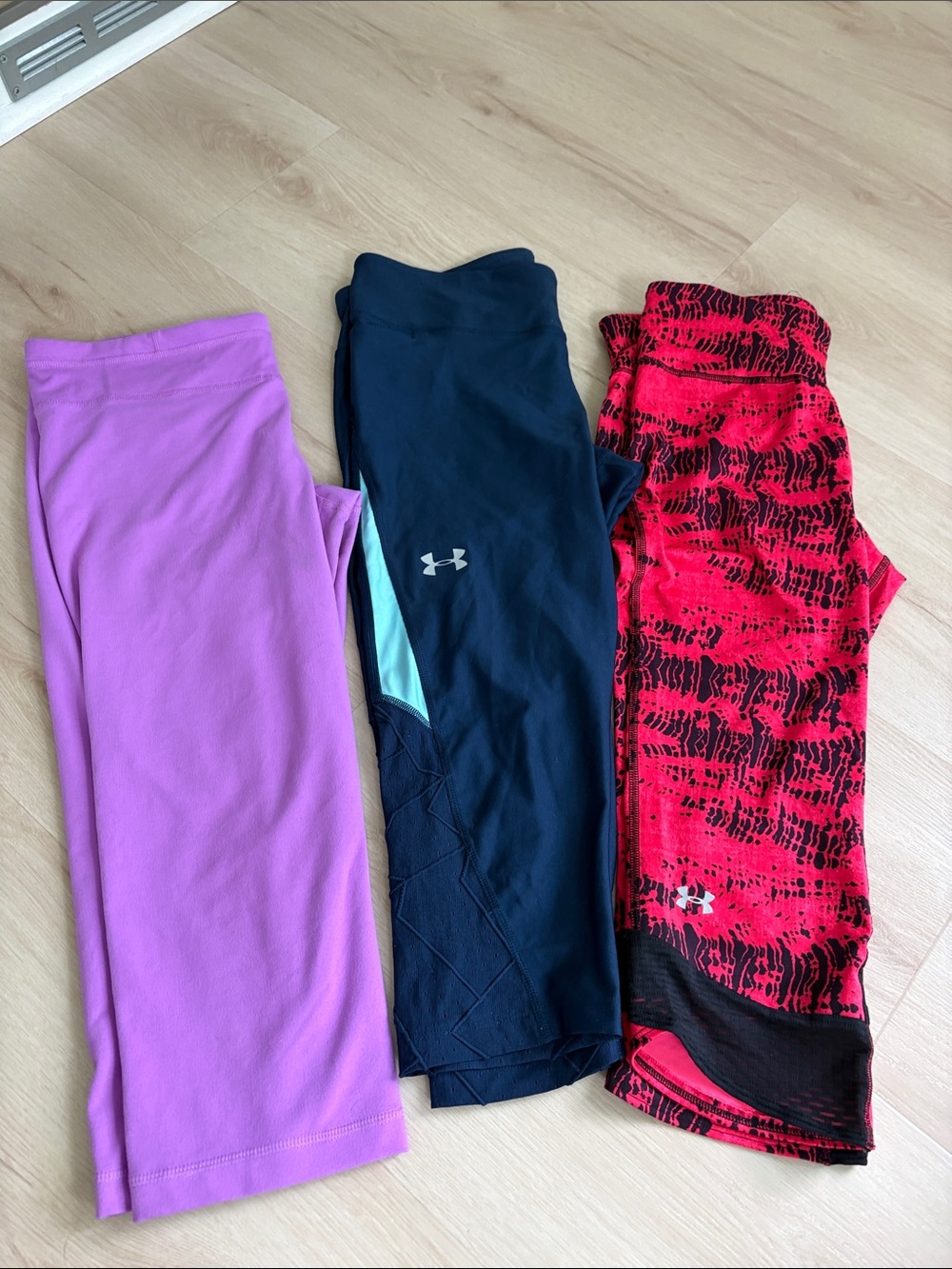 Under Armour Black Capri with Pink Patterned and Lavender Cropped Leggings